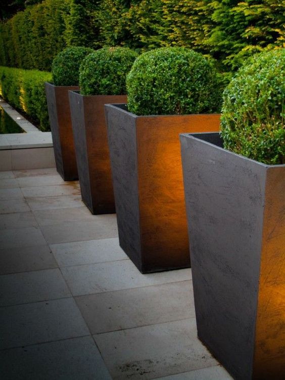 25 Inspirational Ideas to Create a Luxury Resort Style Backyard, illuminated planters