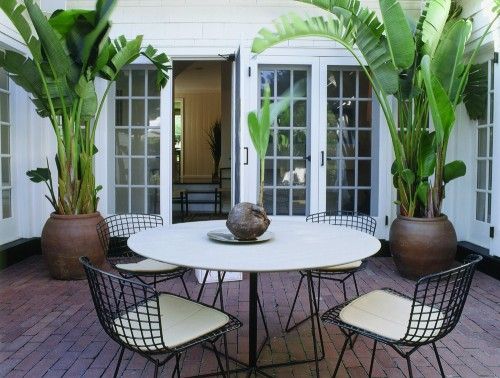 10 Simple Ideas to Give Your Backyard a Complete Makeover This Weekend, oversized plants patio