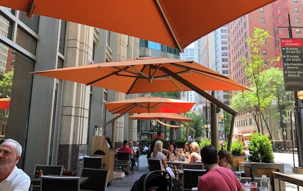 Sidewalk Cafe Orange Umbrellas